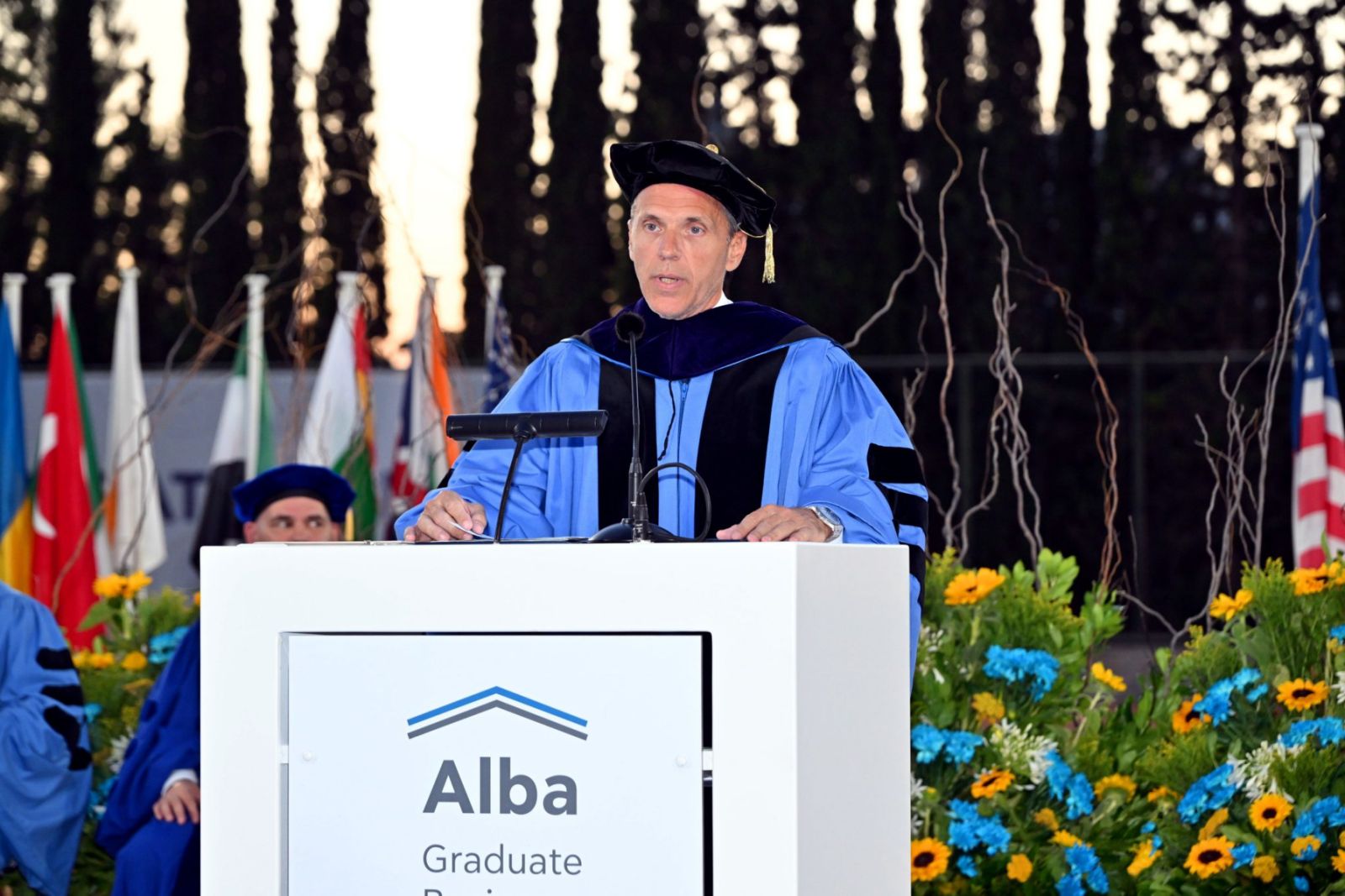 Evangelos J. Pistiolis speaking at Alba Graduate Business School