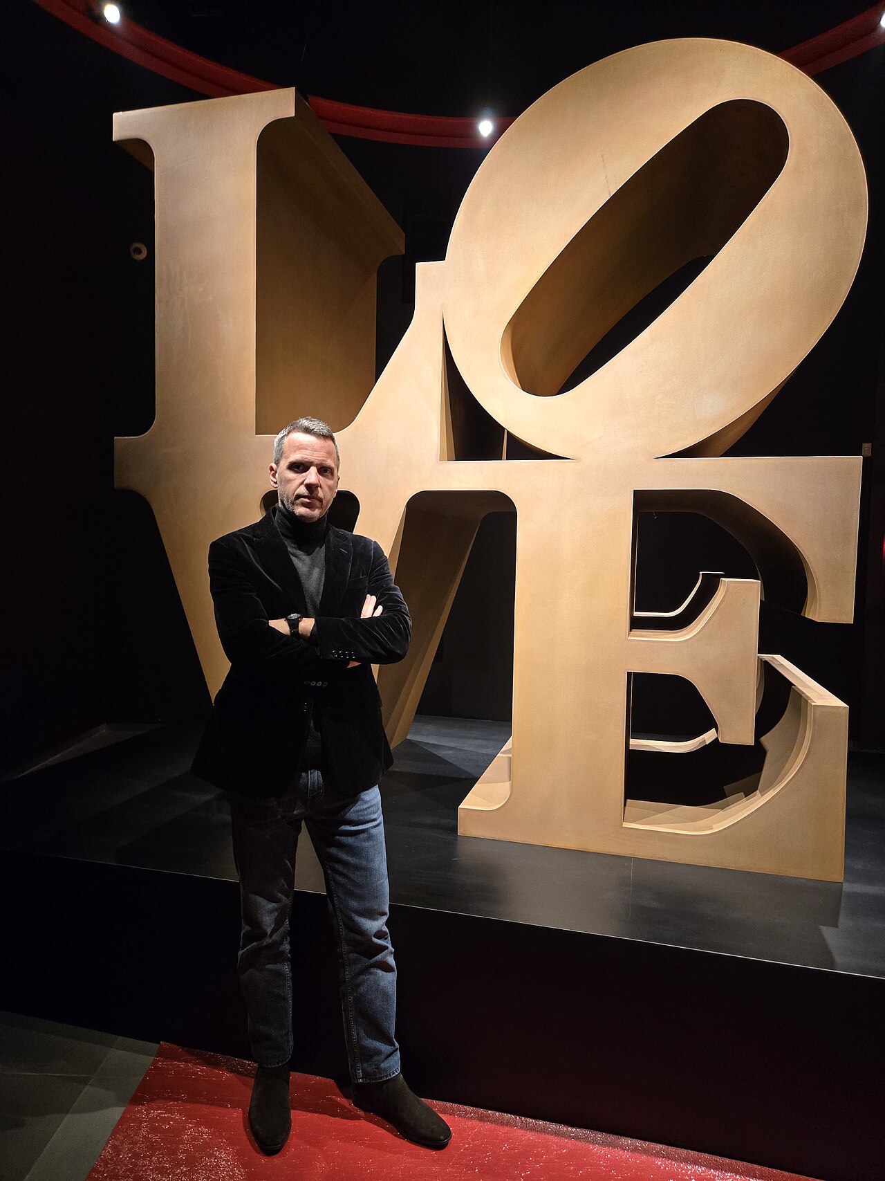 Evangelos J. Pistiolis in front of the LOVE sculpture